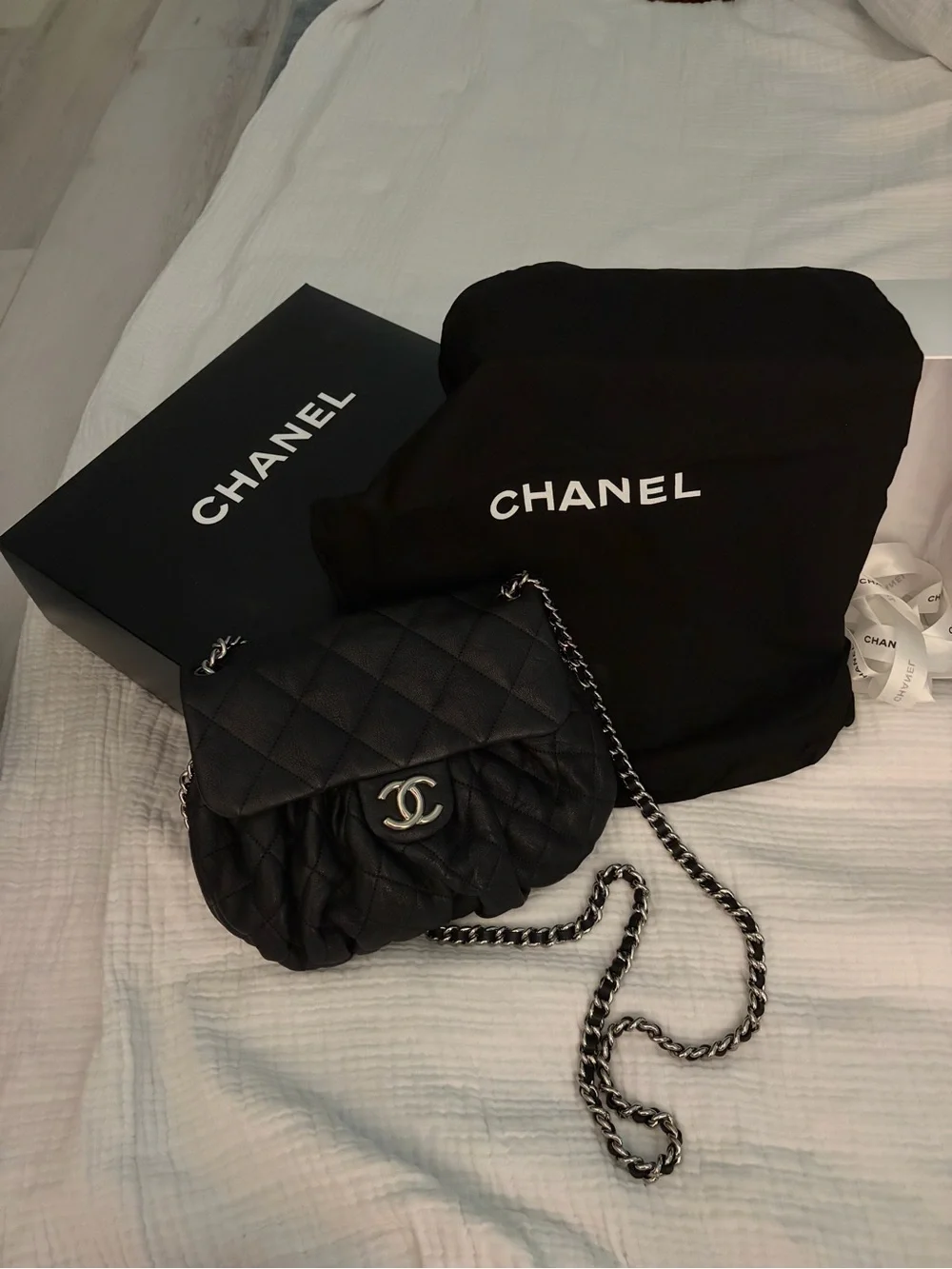 CHANEL Black Quilted Leather Small Flap Crossbody with Silver Chain